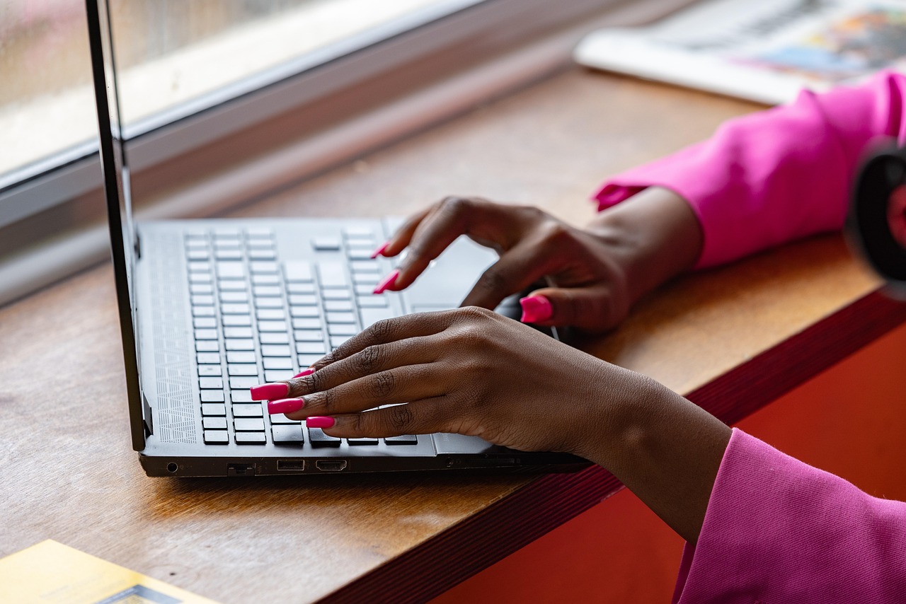Laptop, typing, working — Trek Bikes: Revolutionizing Cycling with Innovation